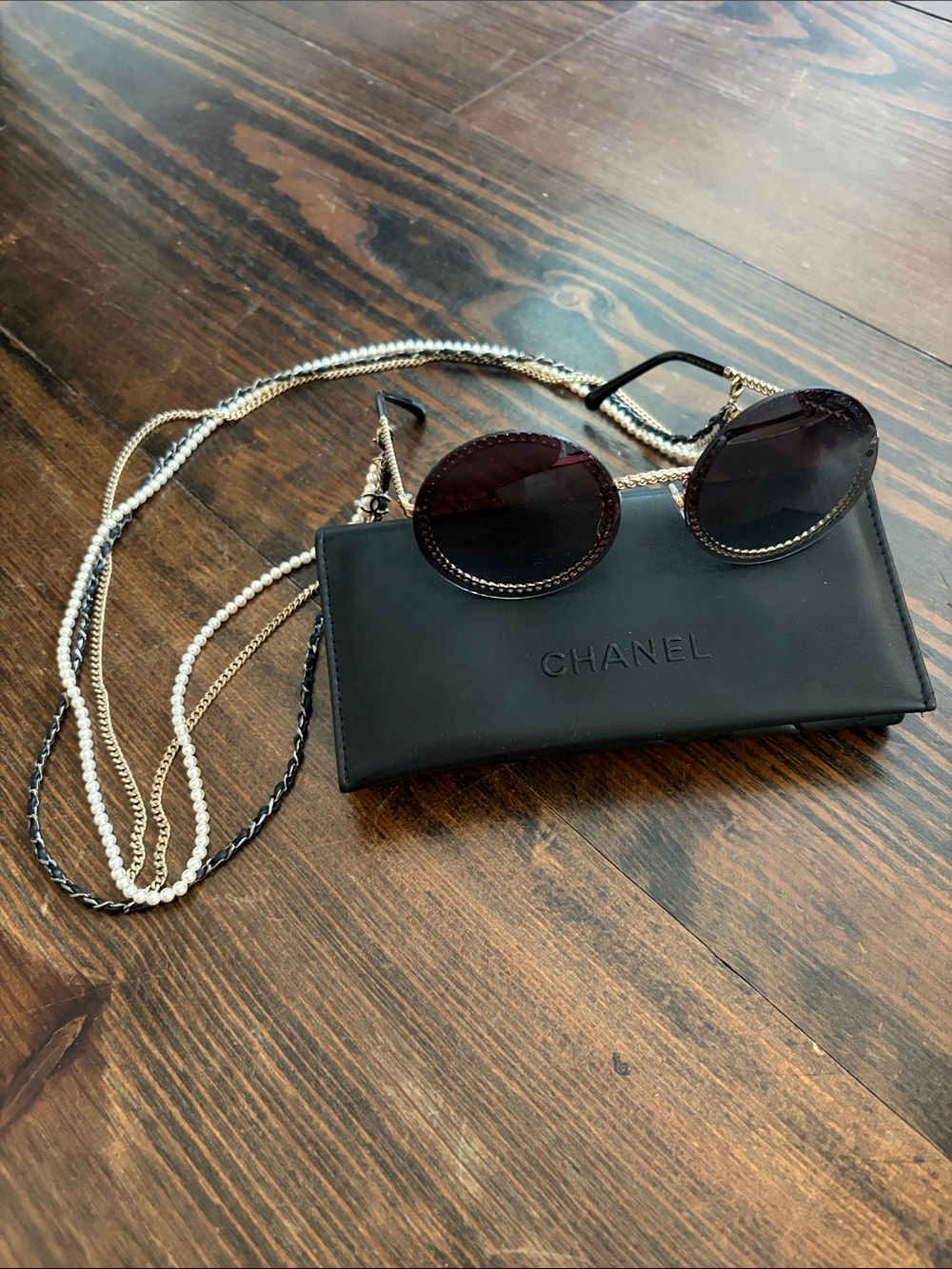 CHANEL Black Frame Sunglasses with Dark Gradient Lenses and Gold and Pearl Chain